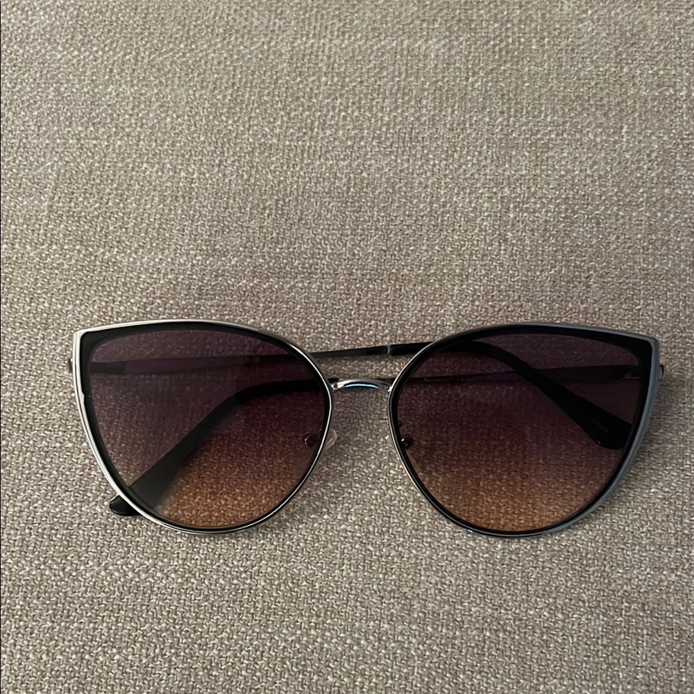Beautiful silver frame Vince Camuto sunglasses .Barely worn.